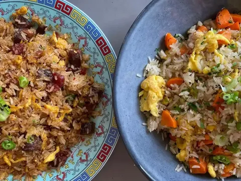 Two bowls of fried rice at Old Thousand in Austin — smoked-brisket fried rice on a patterned Chinese plate beside a bowl of egg-and-carrot fried rice topped with scallions