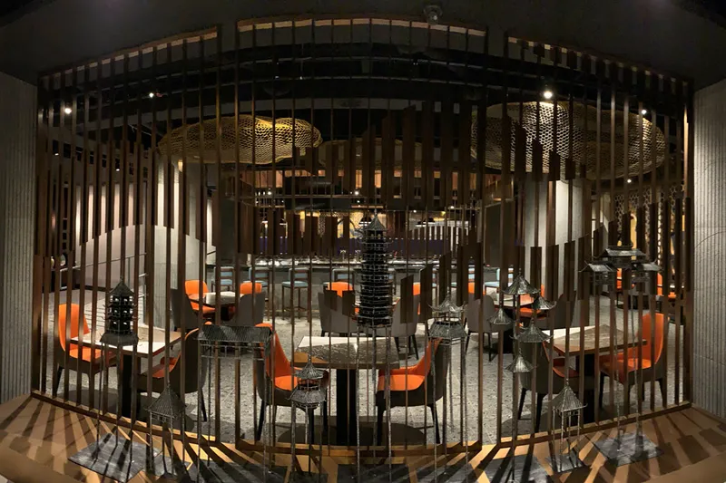 Dining room with woven pendant lights at MingHin Cuisine